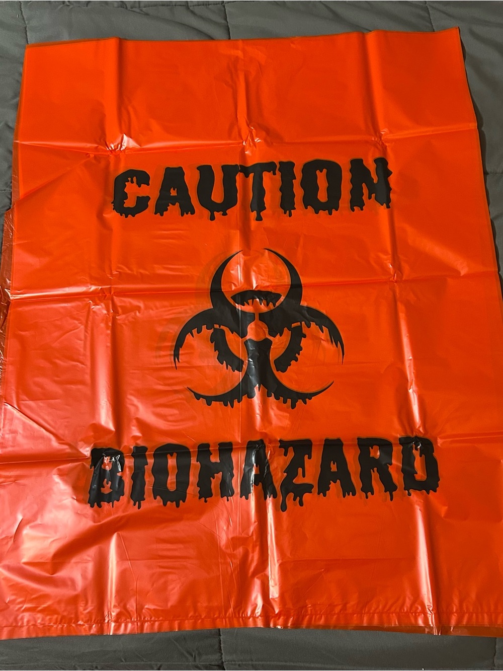 Halloween Leaf Bags Orangish Red “caution biohazard” message on bag